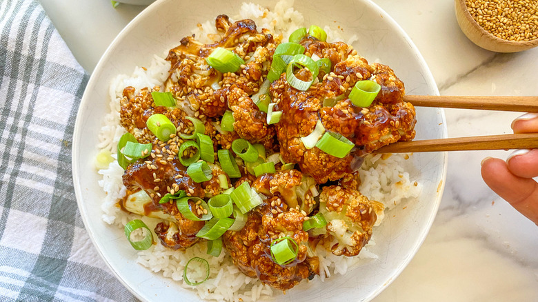 general tso's cauliflower with chopsticks